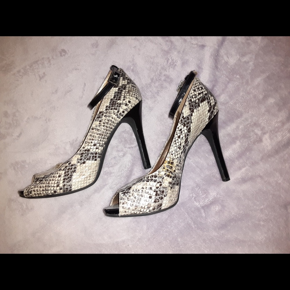 High heeled ankle strap glamor shoes. W size 8.